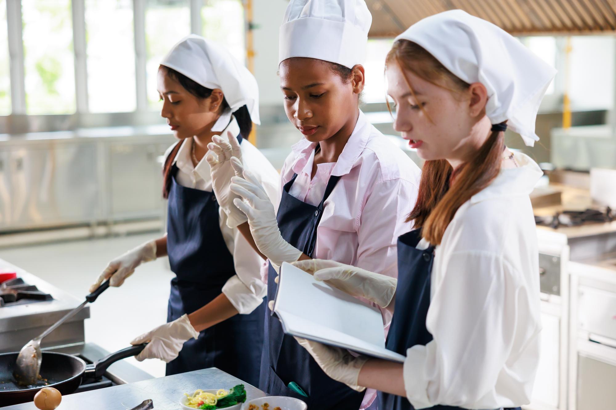 students working in a modern teaching kitchen